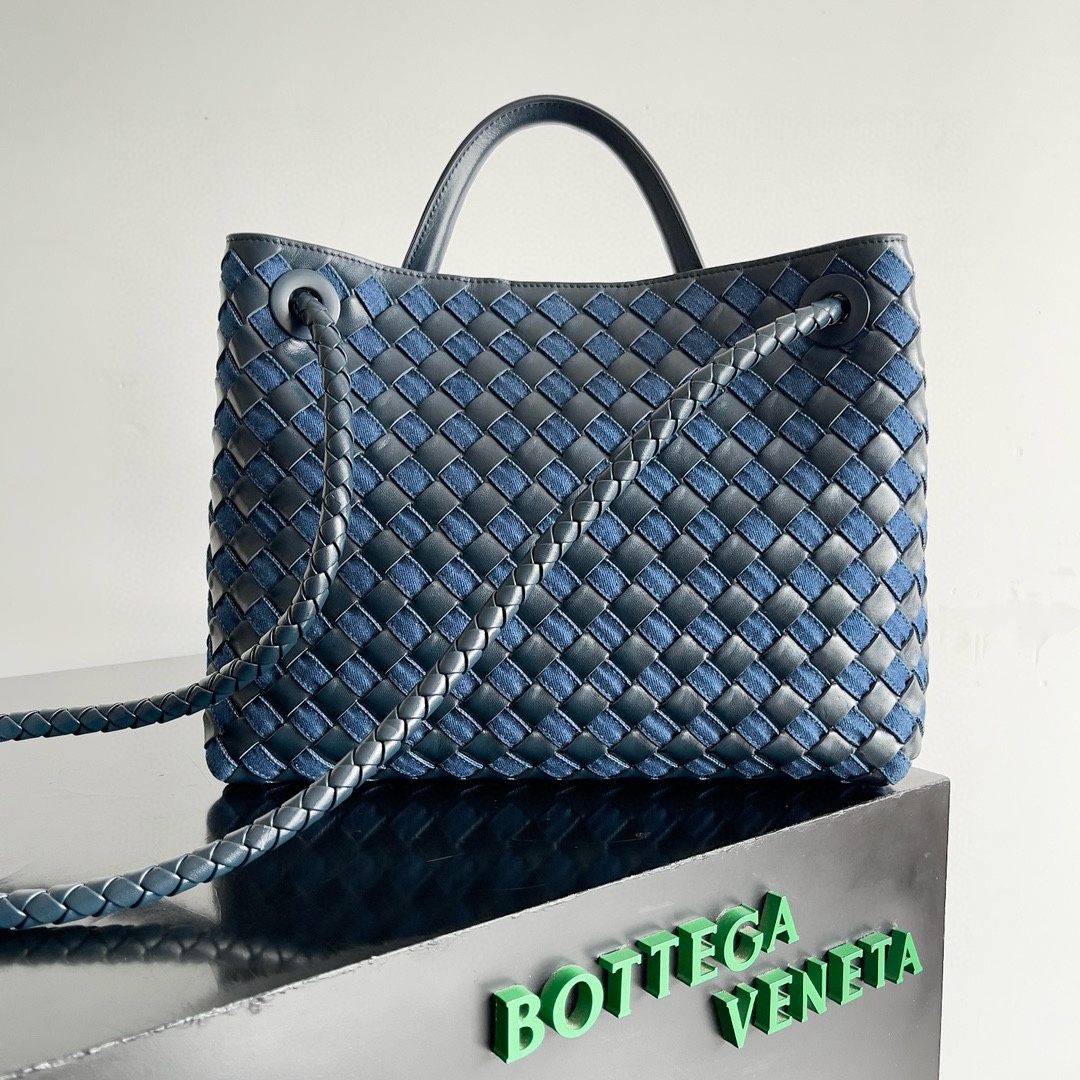 B.V. 🆕 Popular New Andiamo Denim & Leather Bag – Medium This piece offers a fresh interpretation of the iconic Intrecciato weaving technique, showcasing the exceptional craftsmanship of Italian ateliers. “Andiamo” means “Let’s go” in Italian, paying tribute to a spirit of adventure and travel while expressing the idea of craftsmanship in motion. - Image 2