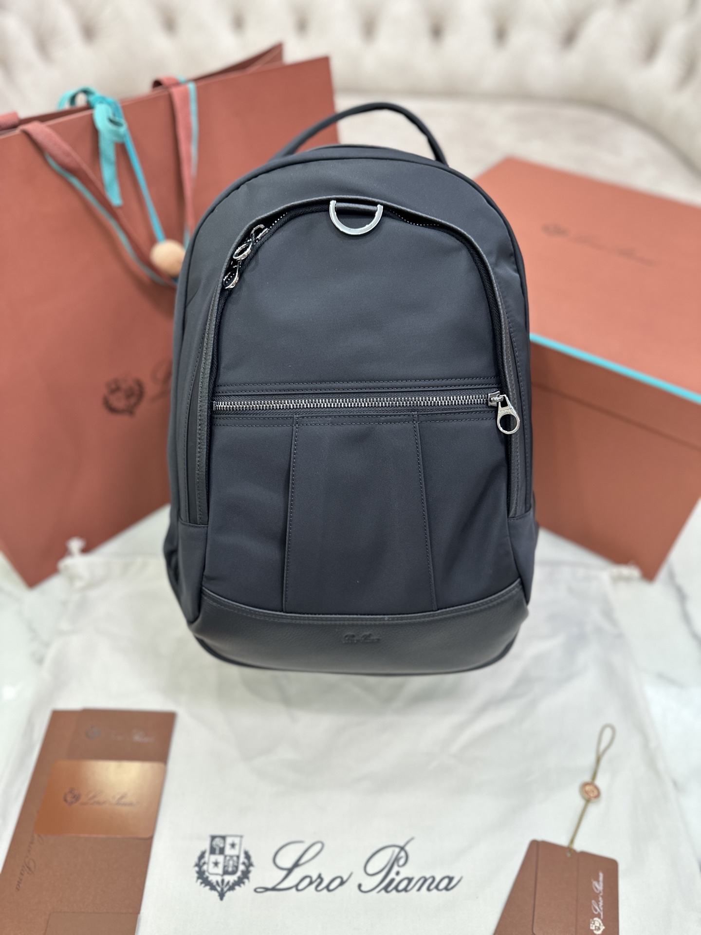 Pioneer Medium Backpack black Dual compartments: zip pocket, open pocket and pen holder in one compartment; laptop organizer in the other Two-way zipper Size: 27*42*20 Material: canvas with cow leather