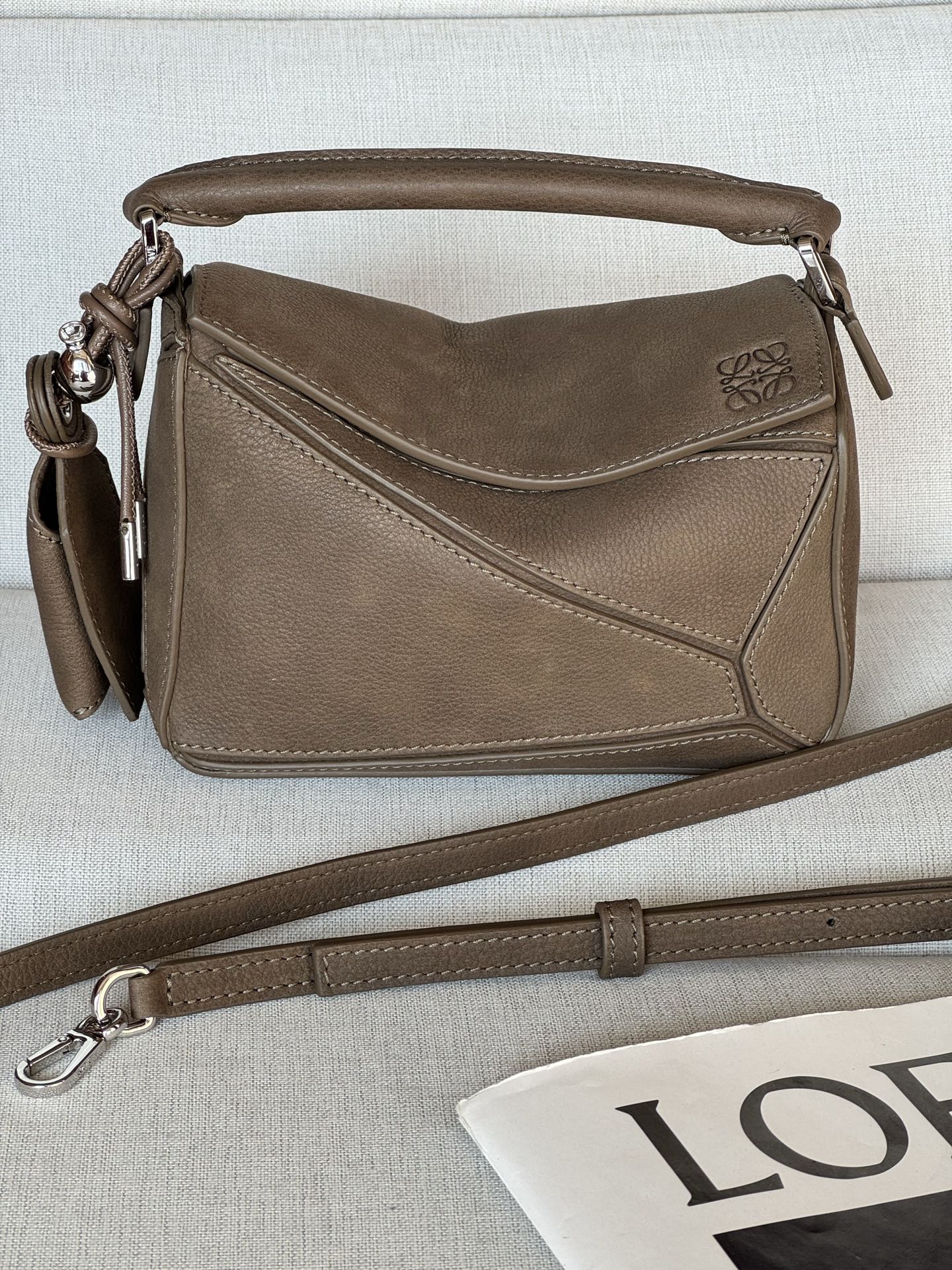 Mini Nubuck Puzzle Bag Model 3008-1 Featherlight Puzzle outlines a cuboid shape with unique geometric lines