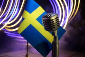 Microphone,On,A,Background,Of,A,Blurry,Flag,Sweden,Close up.