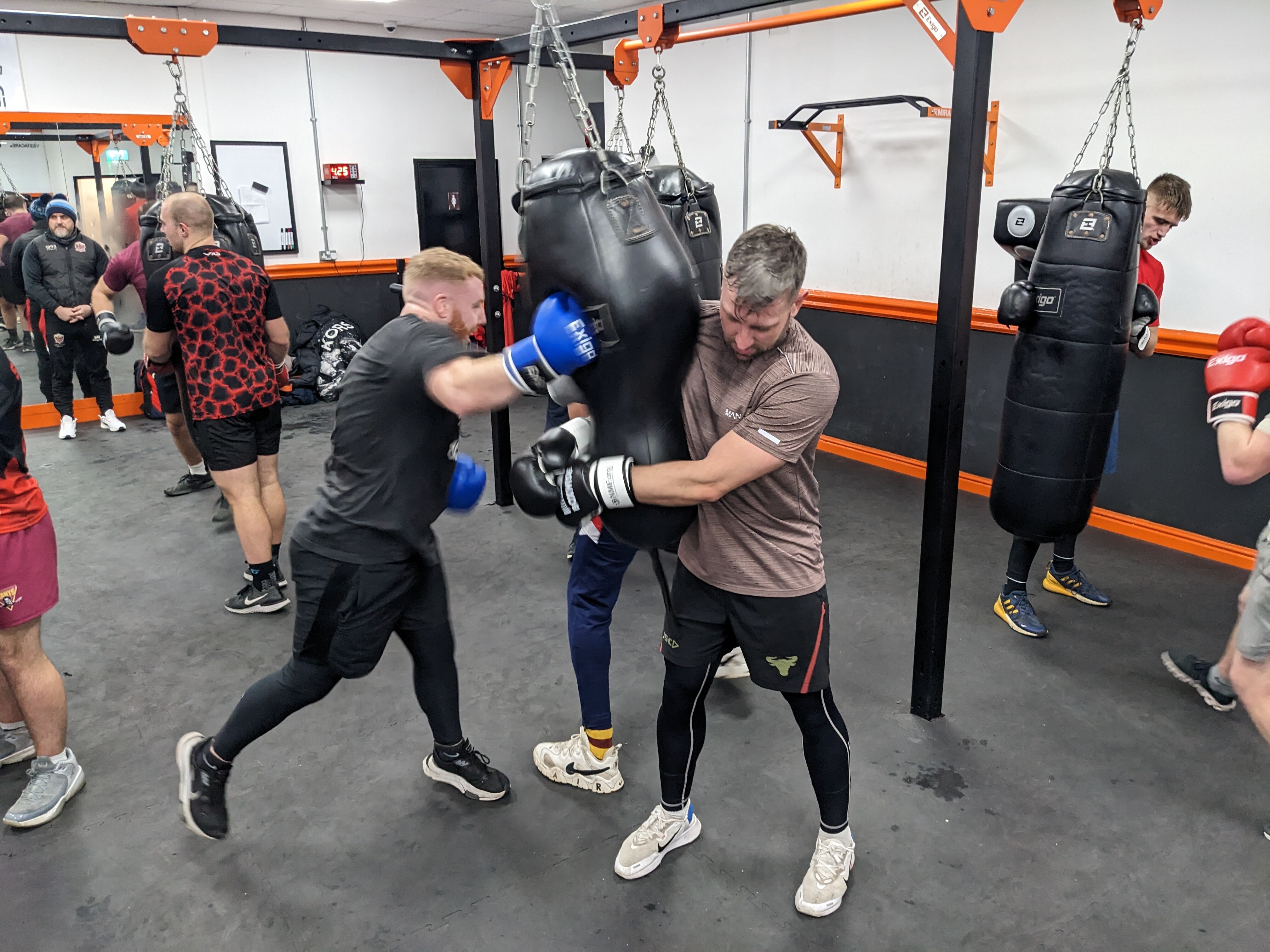Lewis Sheridan and Greg McNally hard at work in the boxing gym