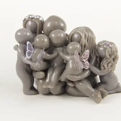 Clay family figurine