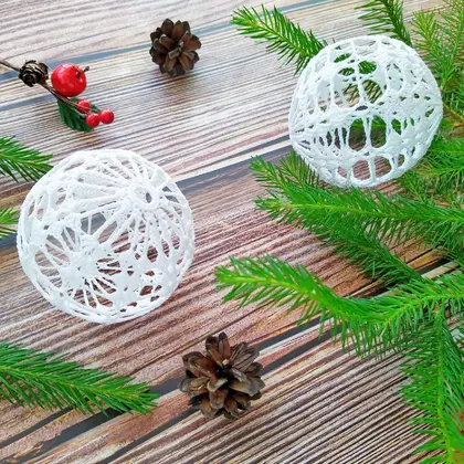 These amazing Christmas bauble set are made from natural thread, then blocked for to stand in a ball shape. You can see through their lacy design because there is no filling inside. White Christmas balls ornaments look great on Christmas tree or just in decorative plate on the table. Also Christmas baubles can make amazing Christmas gift for beloved person.
