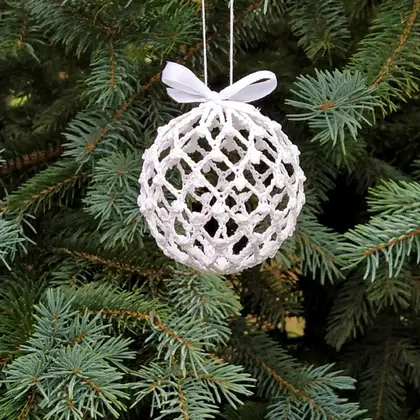 Handmade Christmas ball ornaments crochet pattern easy includes detailed instructions with pictures of each step for additional help. Directions for starching the ornaments are also included. The tutorial contains US and UK crochet terms. This ball pattern has 5 rounds and measures about 2.4" / 6 cm in diameter.