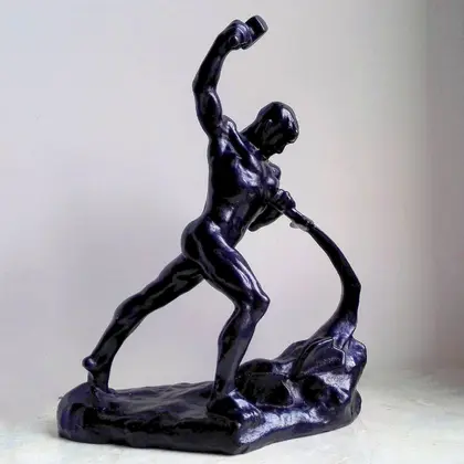 Antique Cast Iron Statuette Blacksmith.Worker. Cast iron figurine