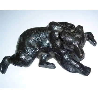 Vintage Cast Iron Statuette Bear. Antique metallic figurine Bear