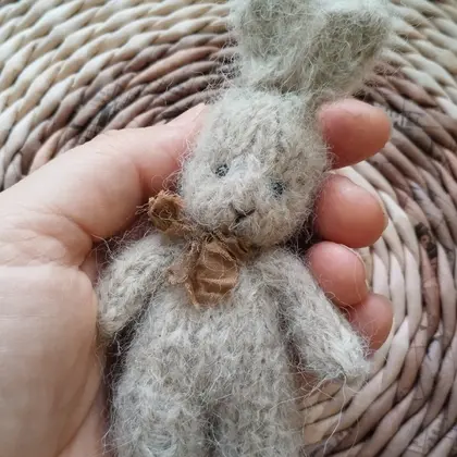 Wonderful toys in the hand (bunny, teddy bear)