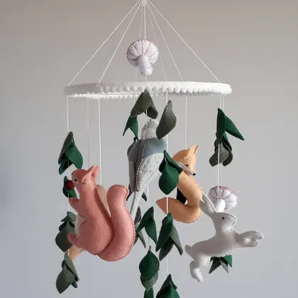 Forest mobile with hare, fox, owl, squirrel and gray jay
