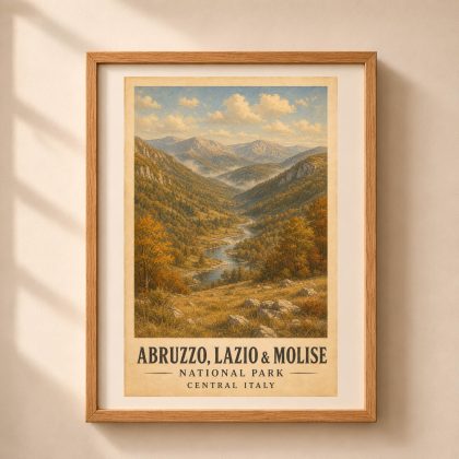 Vertical framed art print of Abruzzo Lazio and Molise National Park featuring autumn Apennine valley and mountains in a warm wooden frame hanging on a beige wall with soft window shadows.