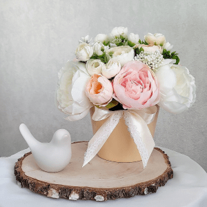 Handmade Marketplace 665 Cute artificial flower arrangement on the table