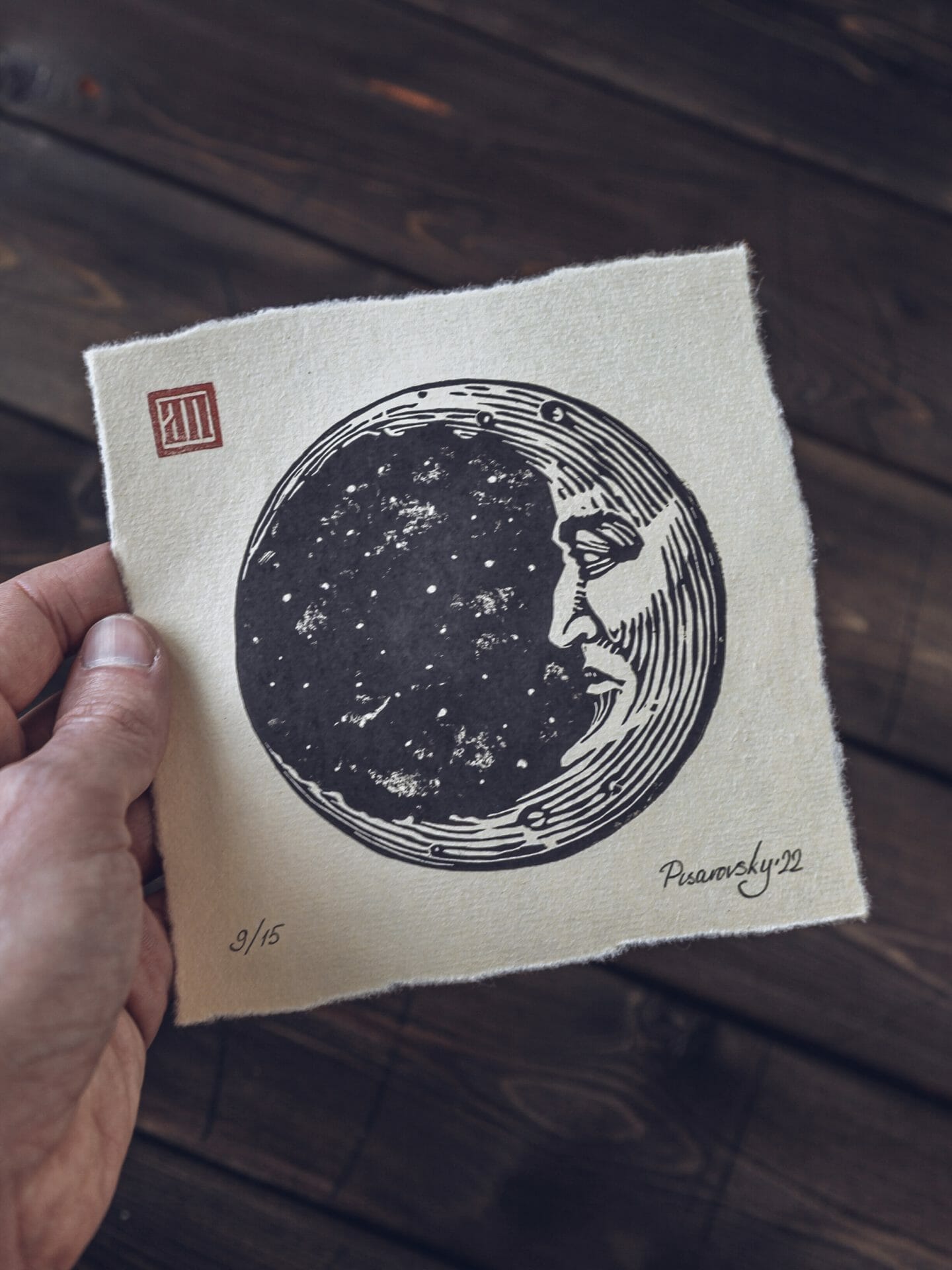 moon crescent linocut print in hand