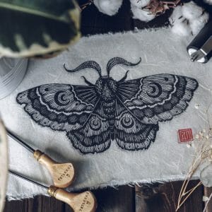 Limited edition Linocut Night Moth hand-printed on lightweight paper made from mulberry fibers