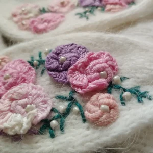 Angora cap with floral embroidery, size newborn