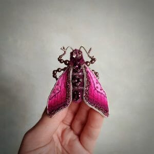 Raspberry moth brooch