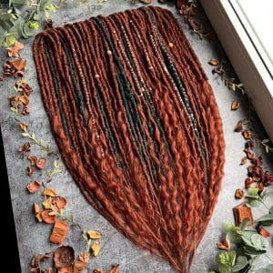 Ginger viking dreadlocks extensions. Red and green dreads and curls