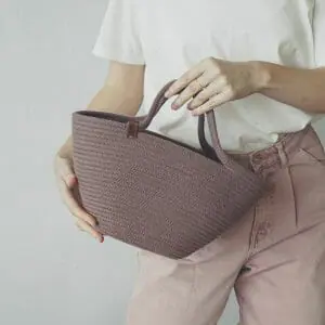 small heather cotton rope woman bag in hands