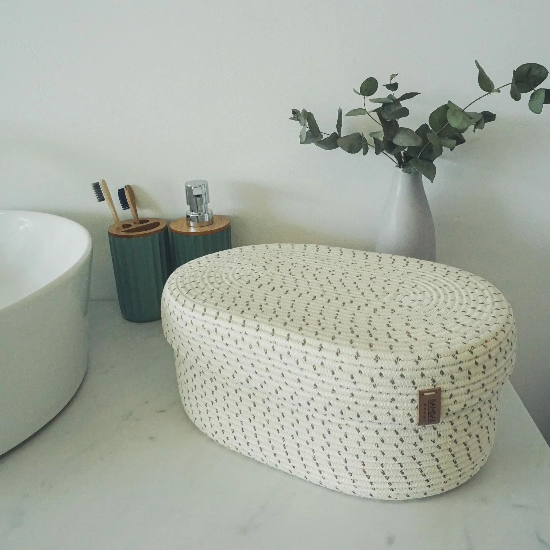 oval white rope basket with lid