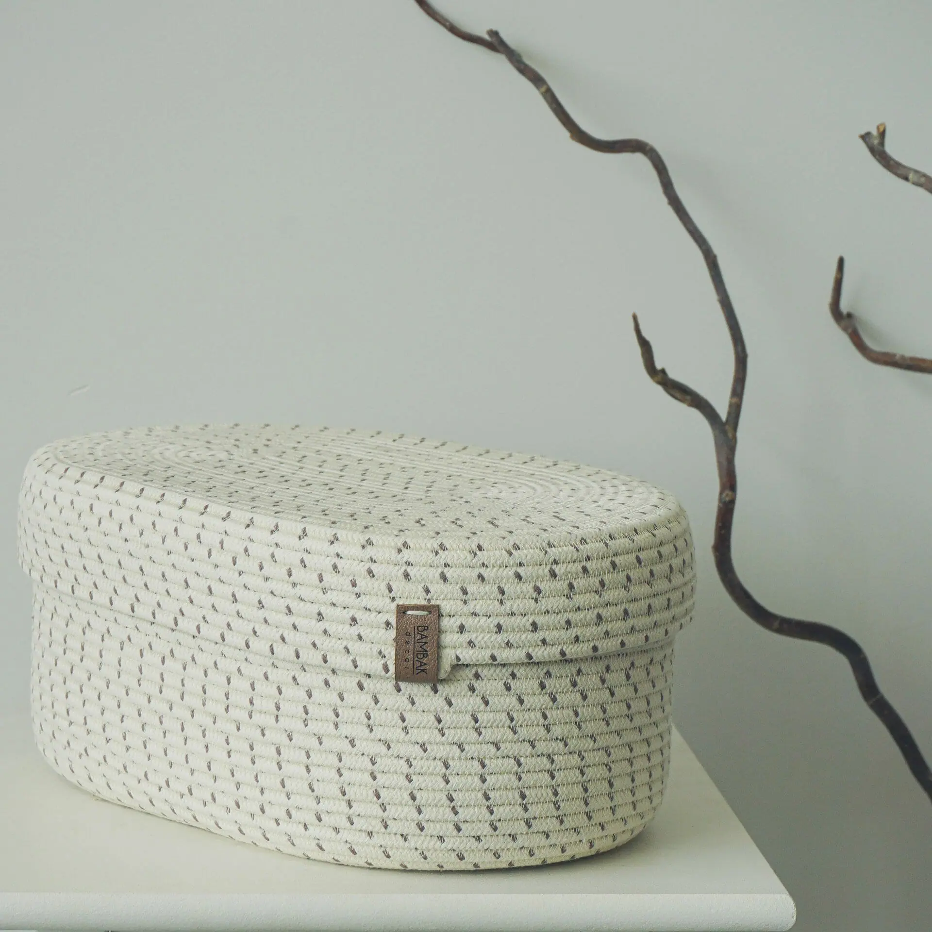 Oval white rope basket with lid for home decor