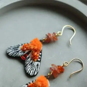 Orange moth earrings with carnelian raw stones