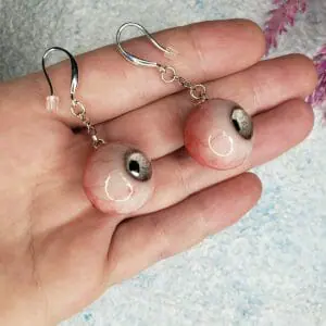 A pair of polymer clay earrings, grey iris eyeball