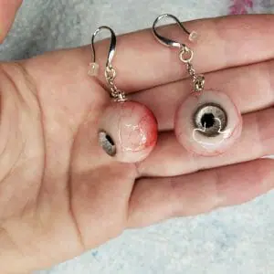 A pair of polymer clay earrings, grey iris eyeball