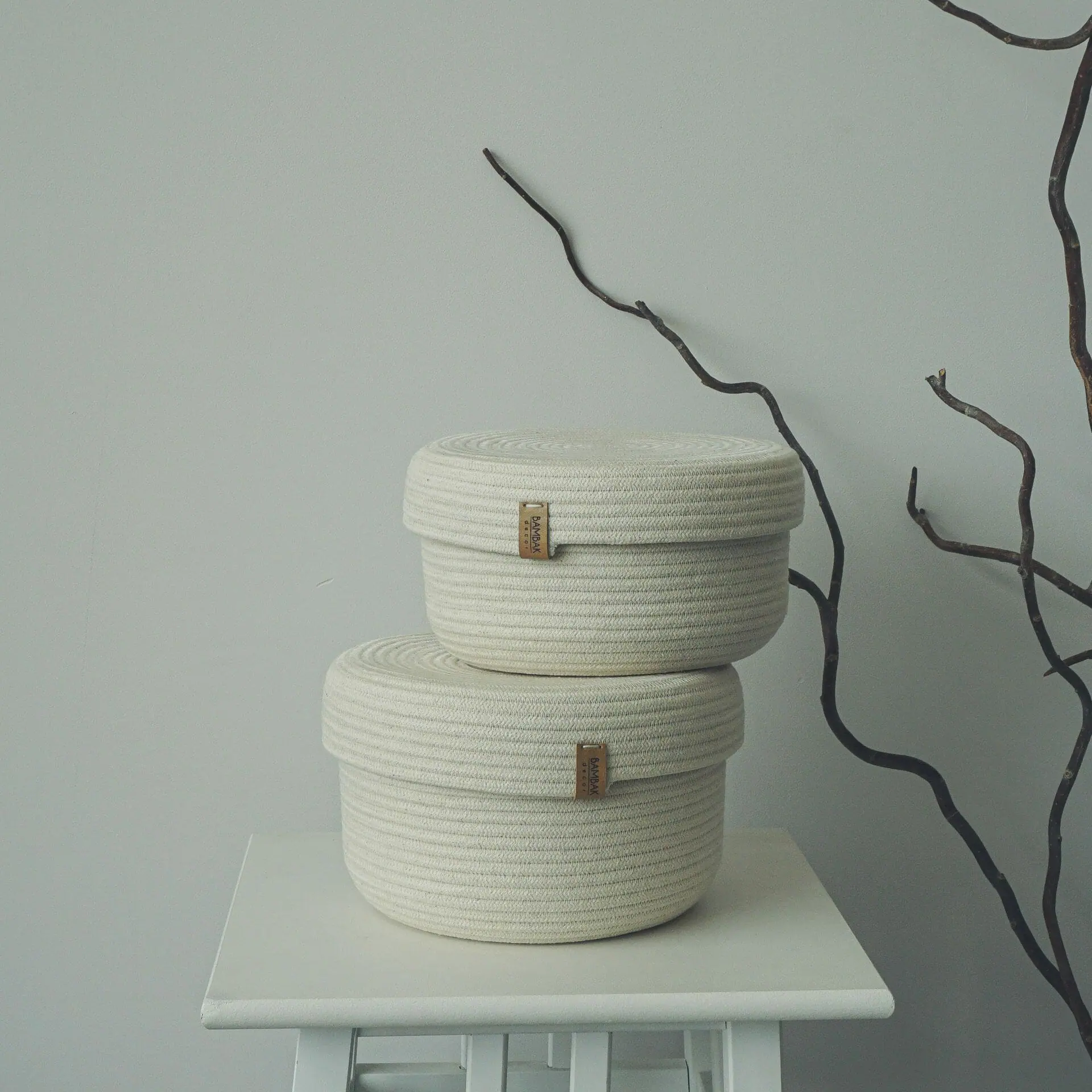 set of two white rope baskets with lid