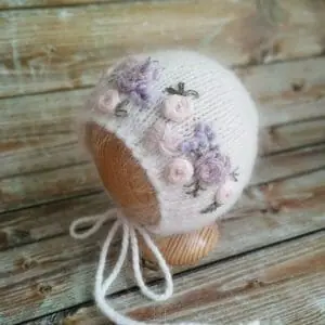 Angora cap with floral embroidery, size newborn