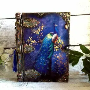 Decorative vintage Tarot card box in the form of book for,or deck of solitaire cards with an image of Peacock.