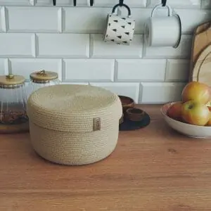 set of two beige baskets with lid on kitchen