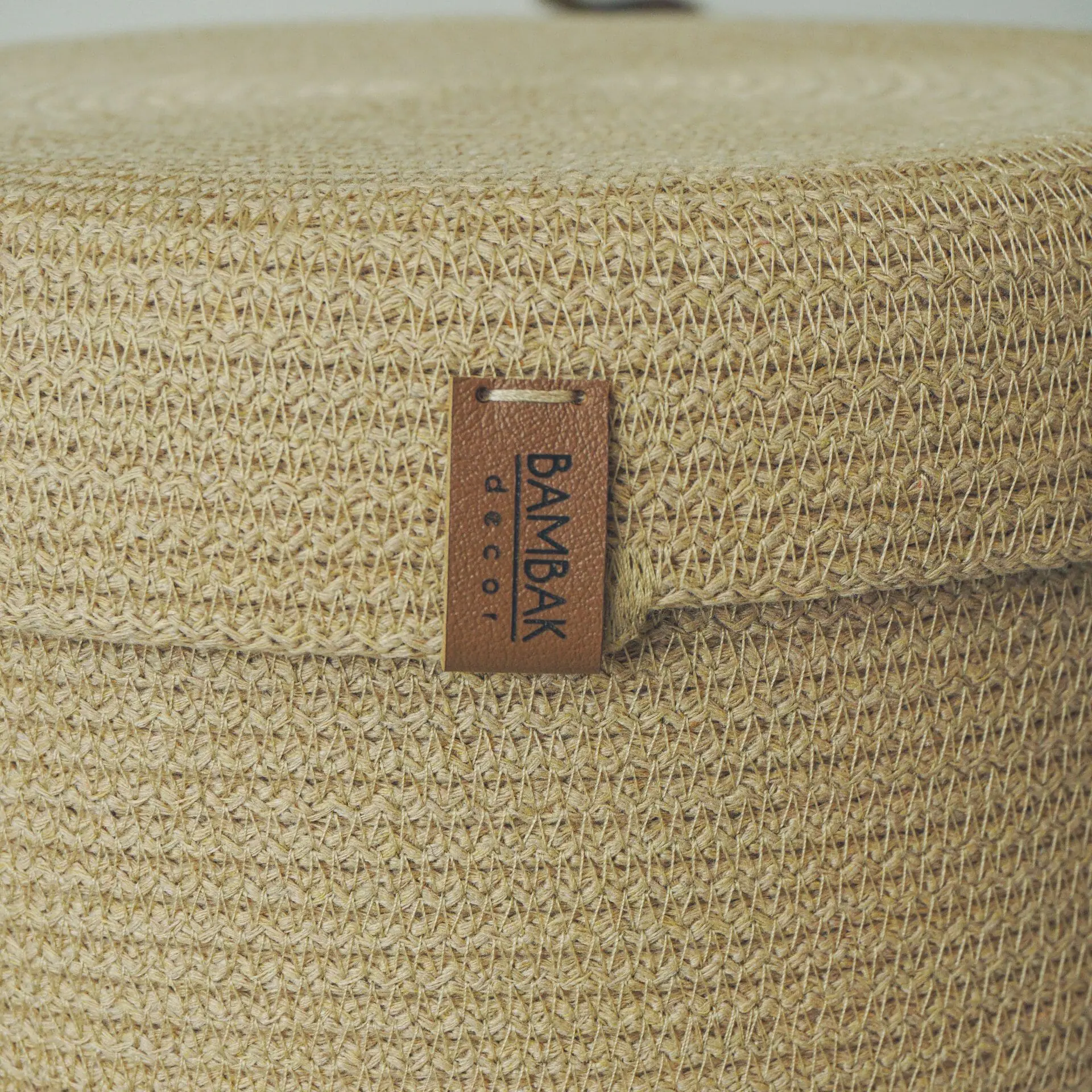 beige rope basket with classic lid close