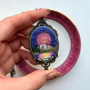 Seven Hour Sunset, landscape embroidery pendant