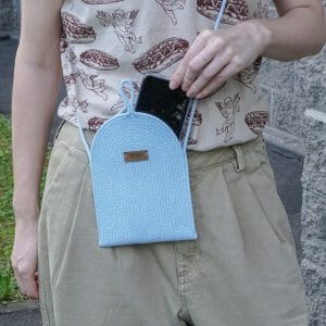 woman light blue cotton rope cross body bag for phone