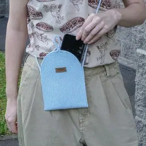 woman light blue cotton rope cross body bag for phone