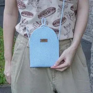 woman light blue cotton rope cross body bag