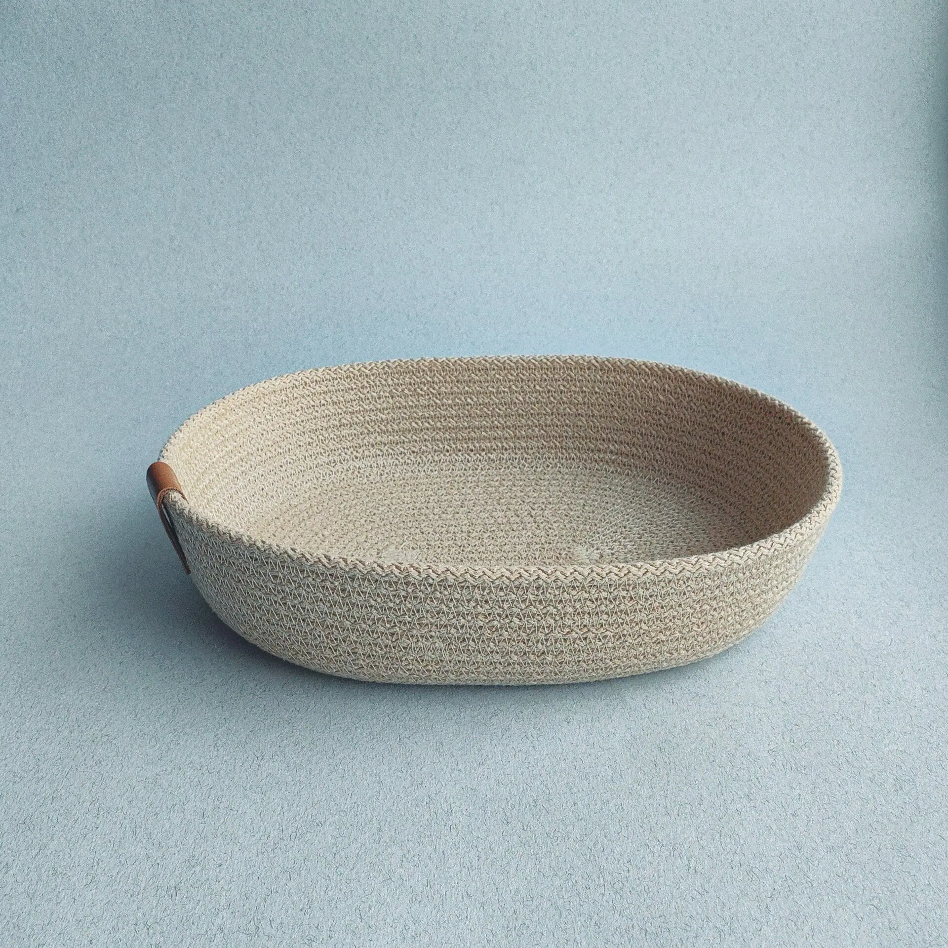 small oval beige cotton rope basket for home