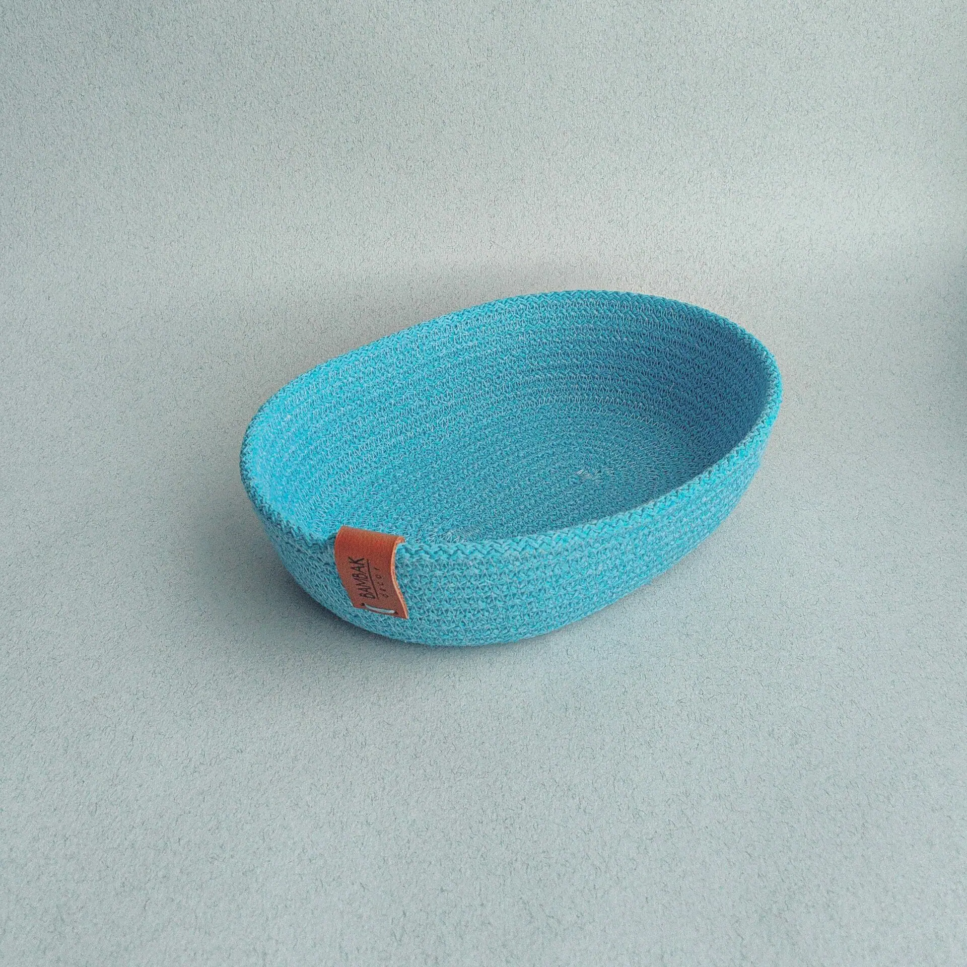 small oval blue cotton rope basket for home and decor