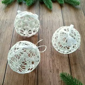 Christmas crochet ornaments pattern includes 3 ball designs.