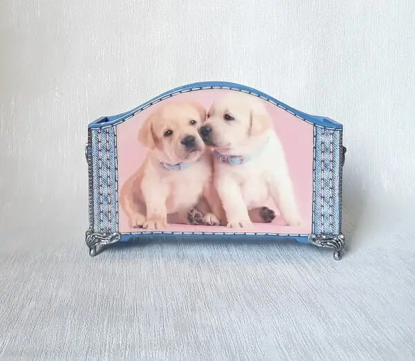 Wooden stand for pencils , pens or combs . Decorative organizer with " Cute Dogs " pattern