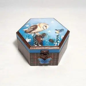 Hexagonal wooden box with an owl