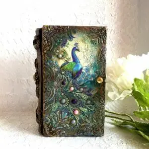 Decorative vintage Tarot card box in the form of book for,or deck of solitaire cards with an image of Peacock.