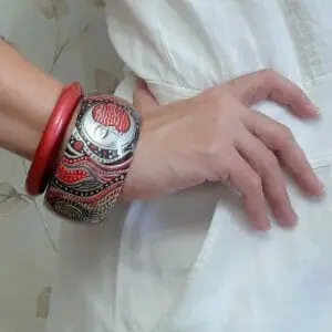 Beautiful wooden bracelet decorated with hand-painted Sun and Moon