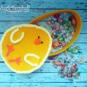 This pattern will help you to create a very bright, beautiful, exclusive package in the form of a yellow chick, bound by the shape of an egg.