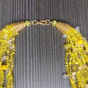 Yellow small airy layered necklace made of beads with citrine.