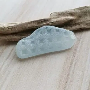 Pale blue sea glass (car shape) B124