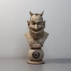 Cartoon devil sculpture