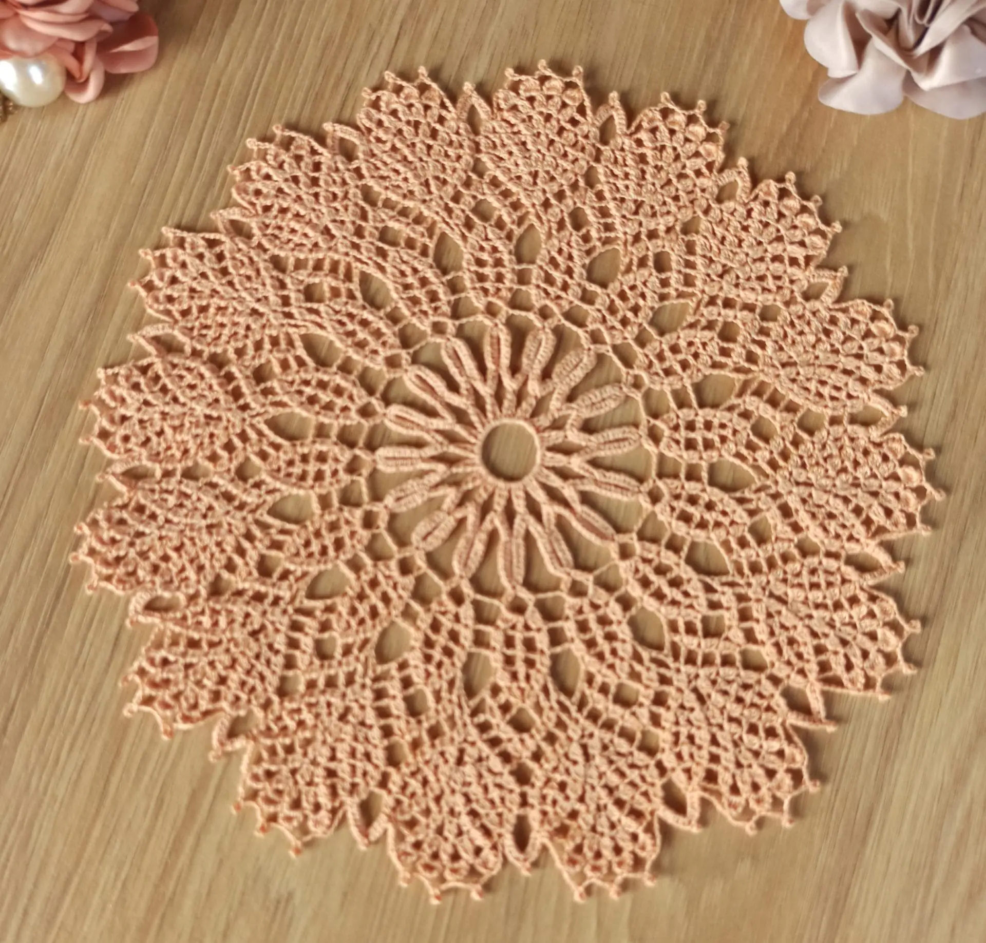 Very delicate lace peach doily of finest cotton