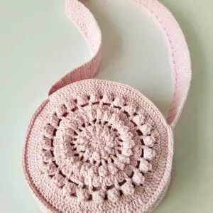 Easy crochet sling round bag pattern