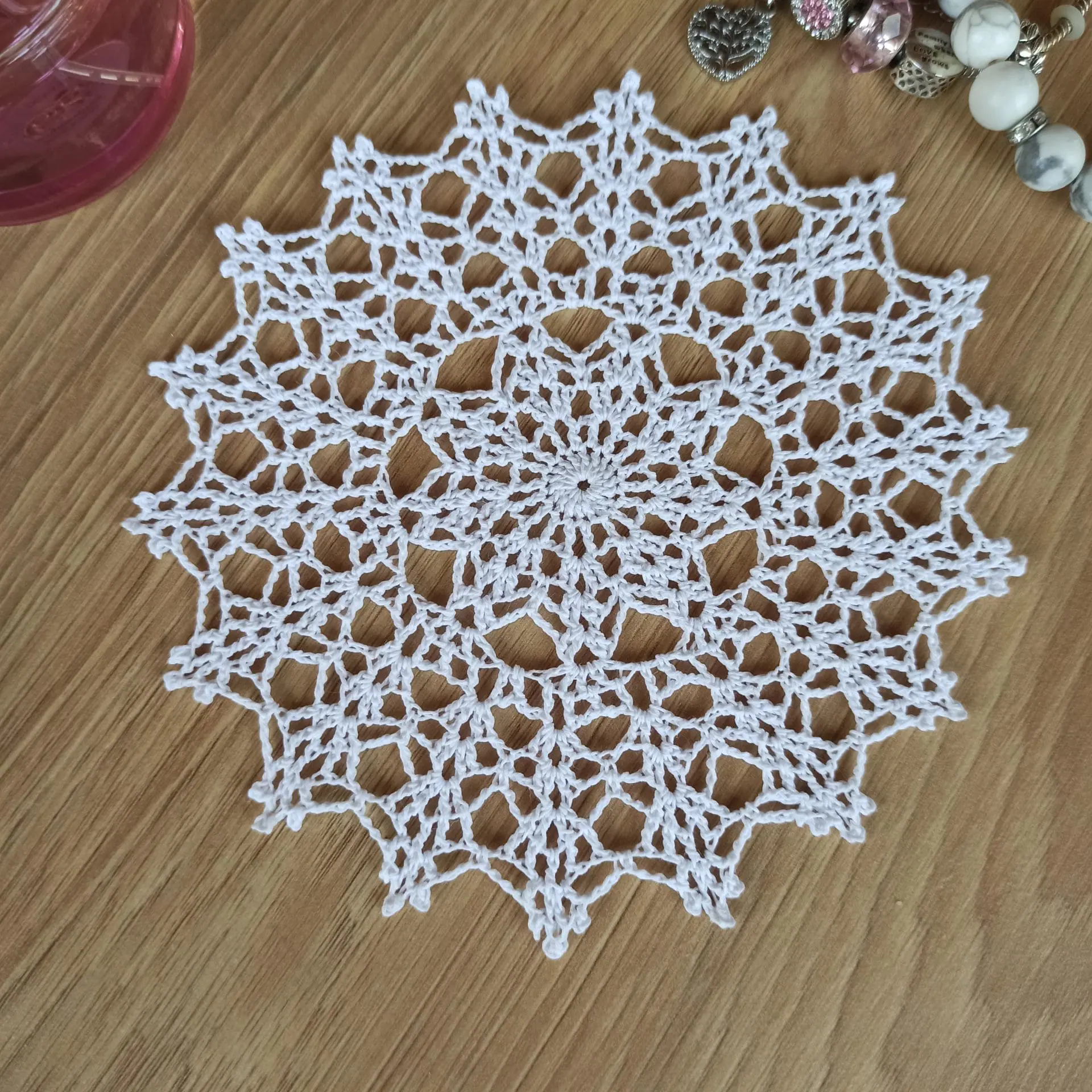 Openwork lace doily made of snow-white cotton