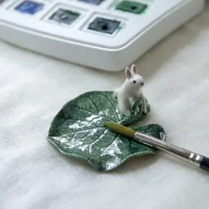 Whimsical Ceramic Leaf and Bunny Brush Rest: Cute Incense Dish