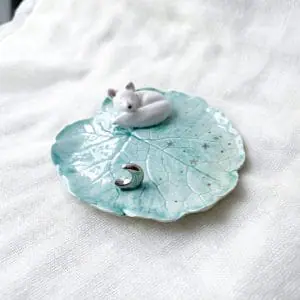 ceramic leaf trinket dish with sleeping arctic fox